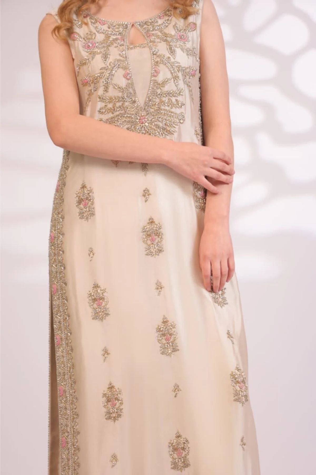 Ivory Bloom Pakistani fashion outfit in ivory, gold tones.